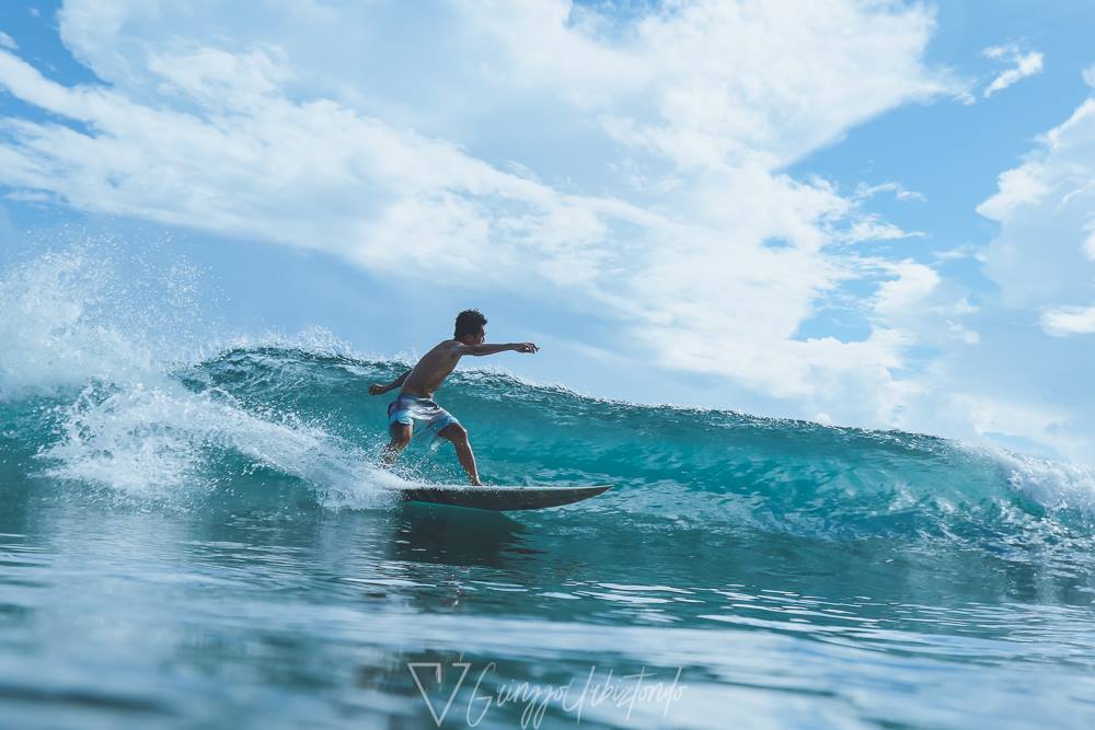 <b class="font-bara"><i class="bi bi-geo-fill h4"></i> DAAN UNION BEACH</b> <br/>This place have the enjoyable atmosphere that includes the sunshine, the black fine sand, warm water and big waves which adds to the fun and excitement of tourist and most especially to the surfers.
